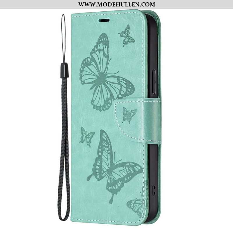 Flip Case Für Xiaomi 13 Mit Kordel Riemchen Mit Schmetterlingen-print