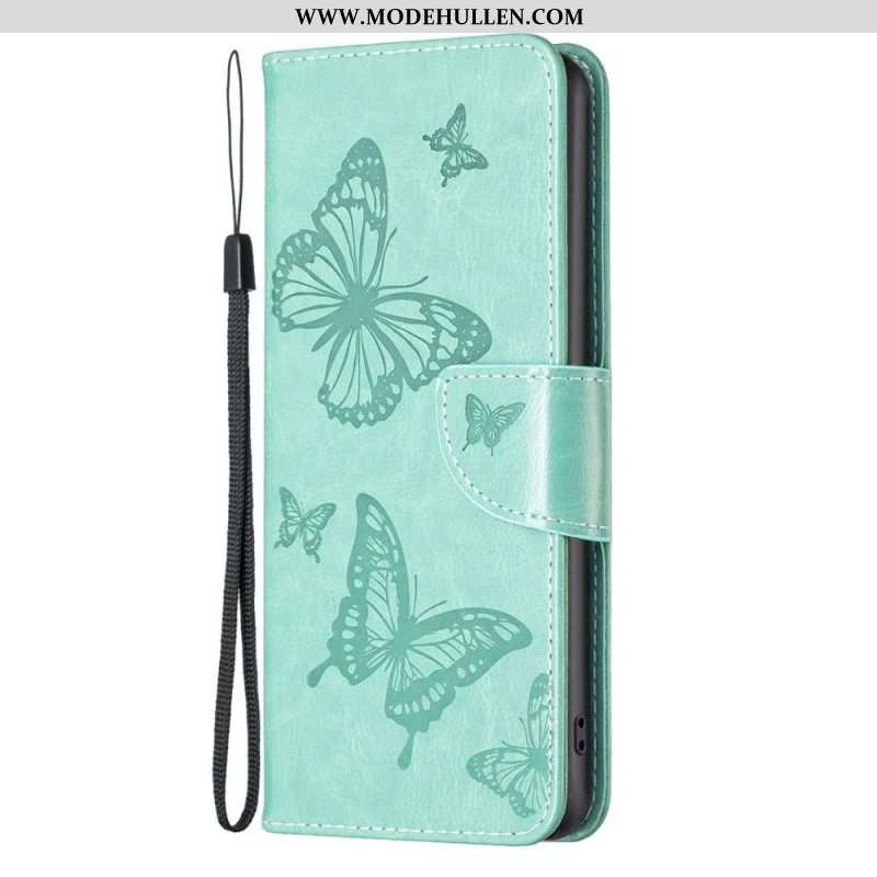 Flip Case Für iPhone 14 Pro Max Mit Kordel Riemchen Mit Schmetterlingen-print