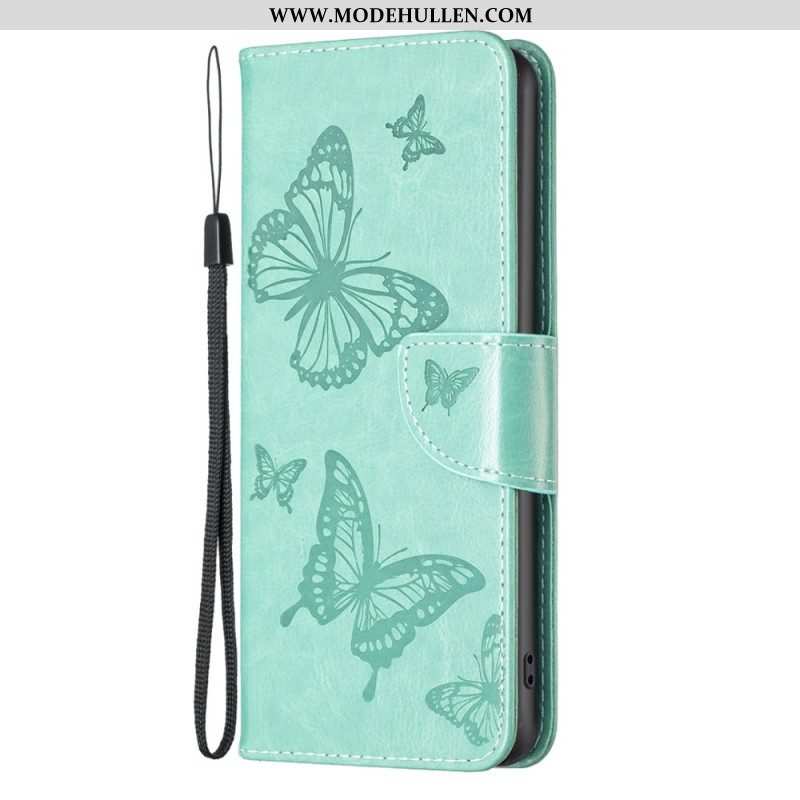 Lederhüllen Für iPhone 15 Plus Mit Kordel Bedruckte Schmetterlinge Mit Riemen